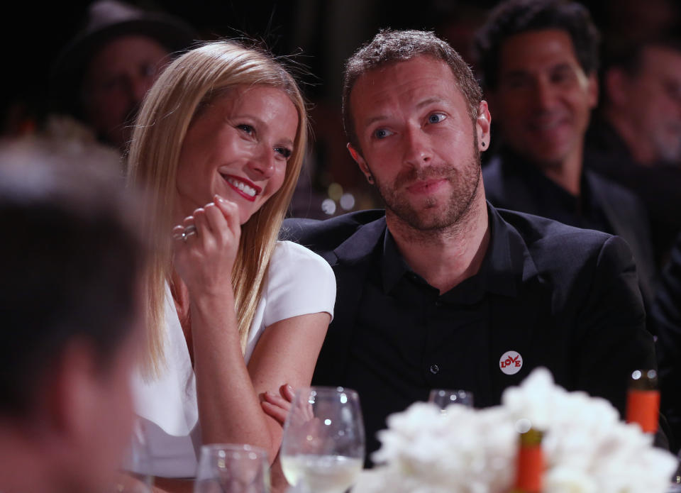 Gwyneth Paltrow, left, and Chris Martin are seen at the 3rd Annual Sean Penn & Friends HELP HAITI HOME Gala on Saturday, Jan. 11, 2014 at the Montage Hotel in Beverly Hills, Calif. (Photo by Colin Young-Wolff /Invision/AP)