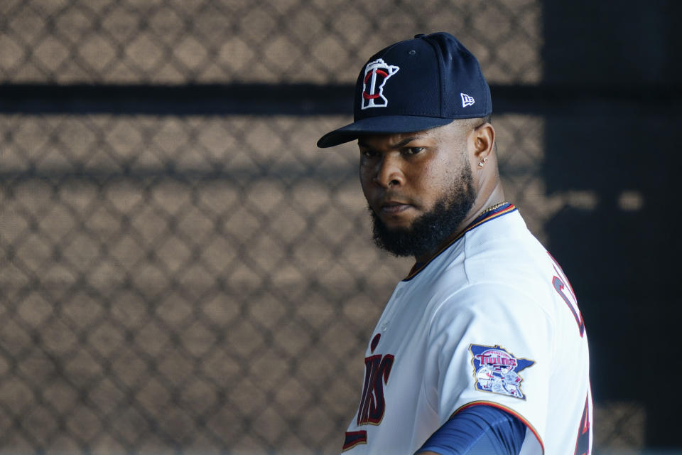 Minnesota Twins Alex Colome sets up to throw a ball during spring training baseball practice on Wednesday, Feb. 24, 2021, in Fort Myers, Fla. The Twins signed Colome away from their chief divisional competition, the Chicago White Sox. (AP Photo/Brynn Anderson)