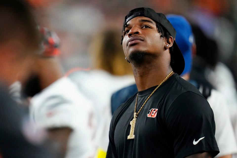 Cincinnati Bengals wide receiver Ja'Marr Chase (1) watches the video board in the second quarter of the NFL Preseason Week One game between the Cincinnati Bengals and Arizona Cardinals at Paycor Stadium.