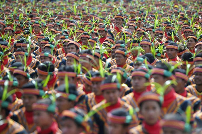 Participants take part in a mass traditional Saman dance performance in Aceh on Indonesia's Sumatra island on August 13, 2017