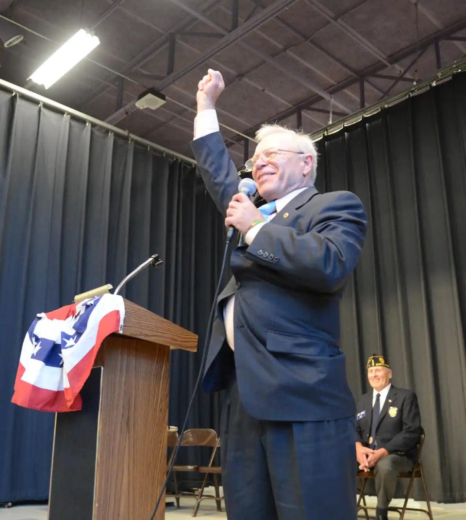 Paul Monti speaks about his son Sgt. First Class Jared Monti, Congressional Medal of Honor recipient. The LaLiberte Elementary School presented the Sixth Annual Raynham's Veteran's Day Salute to our U.S. Troops on Wednesday, Nov. 6, 2013.