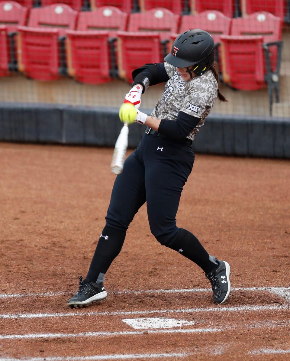 Texas Tech’s Peyton Blythe (23) swings at the ball in the first inning of a nonconference game against North Dakota on Thursday, March 2, 2023 during the Jeannine McHaney Memorial Classic held at Rocky Johnson Field in Lubbock, Texas.