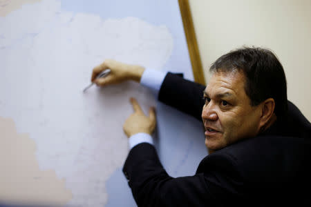 Secretary for Investment Partnerships Program Adalberto Santos de Vasconcelos points to a map during an interview for Reuters in Brasilia, Brazil January 21, 2019. REUTERS/Adriano Machado