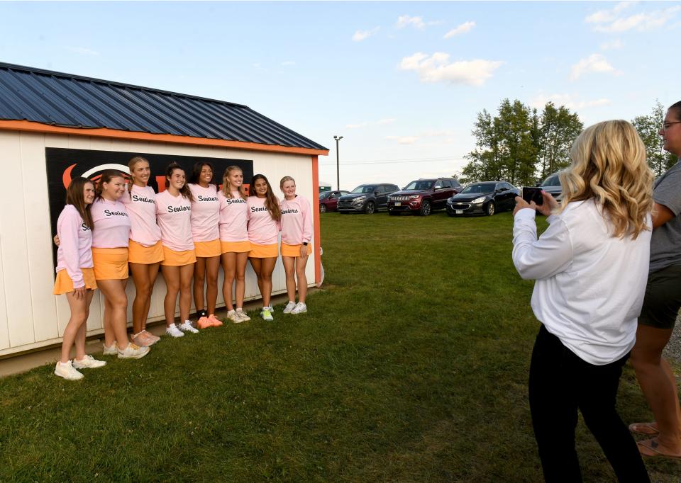 Players line up for photos during senior night at  Hoover.  Wednesday, Sept 20, 2023.