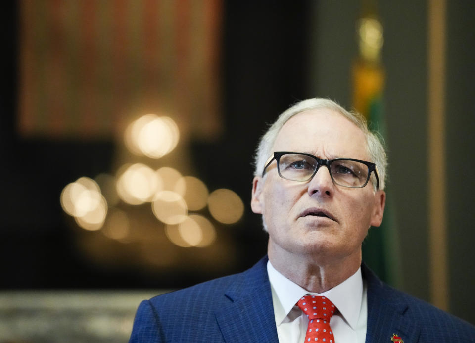 FILE - Washington Gov. Jay Inslee speaks at the Washington state Capitol in Olympia, Wash., Tuesday, April 25, 2023. Washington state passed legal protections Thursday, April 27, for people who travel there seeking reproductive and gender-affirming procedures and treatment, becoming the latest Democrat-led state to enact safeguards as Republican-led states ban or restrict care. (AP Photo/Lindsey Wasson, File)