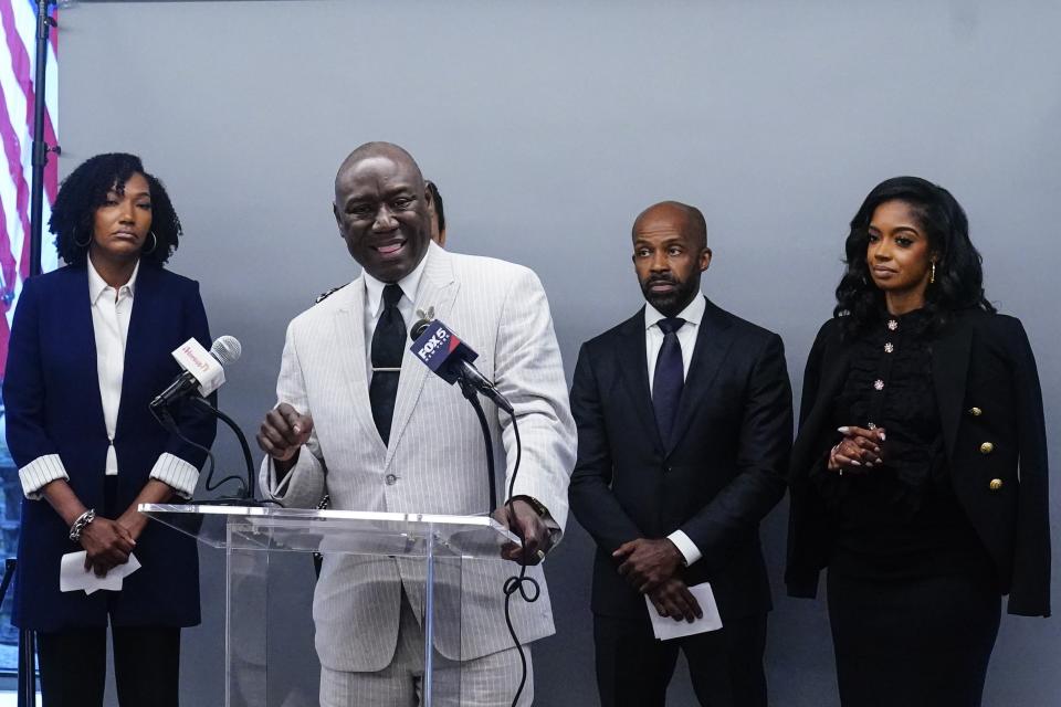 Ayana Parsons, left, and Attorney Alphonso David, second from right, and Arian simone, right, watch as Ben Crump speaks during a news conference Thursday, Aug. 10, 2023, in New York. Attorneys for an Atlanta-based venture capital firm being sued over a grant program investing in Black women have vowed to fight back against the lawsuit calling it misguided and frivolous. (AP Photo/Frank Franklin II)