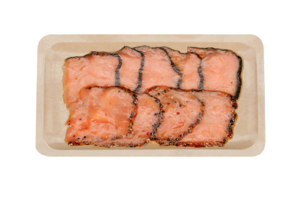 Cold smoked salmon on CRYOVAC® brand barrier formable paper