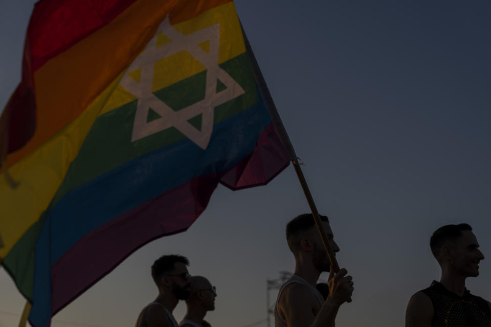 People attend a "Pride and Hope Rally" LGBTQ+ Pride event in Tel Aviv, Israel, Thursday, June 6, 2024. (AP Photo/Ariel Schalit)