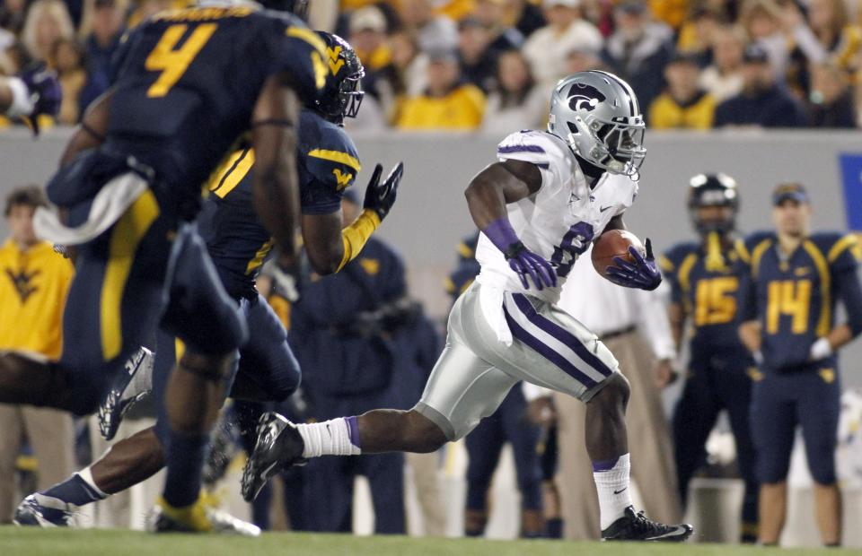 Angelo Pease #8 of the Kansas State Wildcats carries the ball against the West Virginia Mountaineers during the game on October 20, 2012 at Mountaineer Field in Morgantown, West Virginia. (Photo by Justin K. Aller/Getty Images)