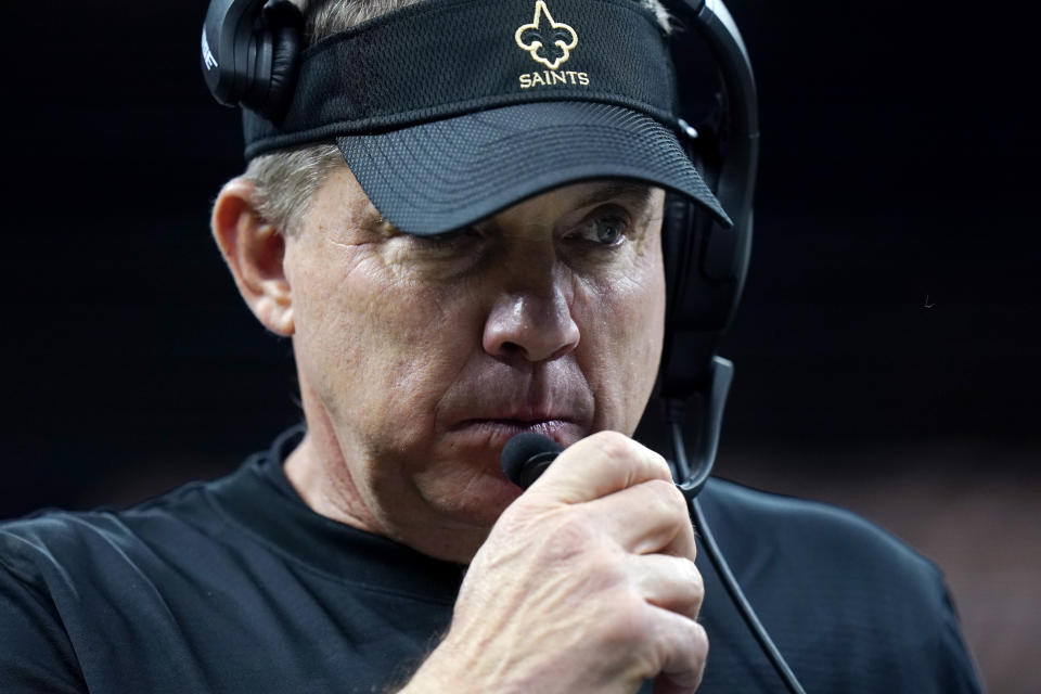 New Orleans Saints head coach Sean Payton talks on the sideline in the first half of an NFL football game against the Carolina Panthers in New Orleans, Sunday, Jan. 2, 2022. (AP Photo/Gerald Herbert)