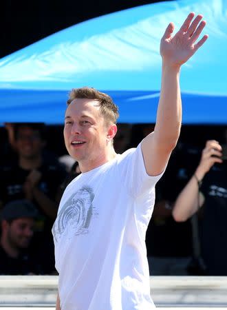 Elon Musk, founder, CEO and lead designer at SpaceX and co-founder of Tesla, arrives at the SpaceX Hyperloop Pod Competition II in Hawthorne, California, U.S., August 27, 2017. REUTERS/Mike Blake/Files