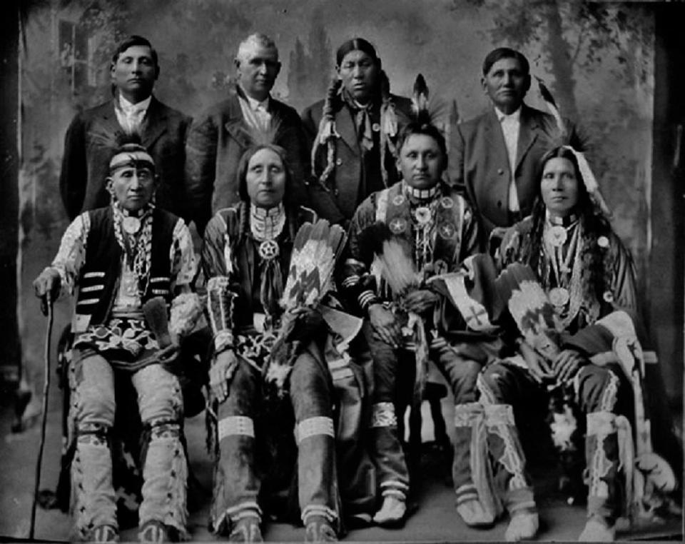 First Americans Museum Director and CEO James Pepper Henry, who is Kaw, treasures this black-and-white photo of Kaw Nation delegates who traveled to Washington, D.C., in 1909. His great-grandfather, James Pepper, or Mokompah, meaning "Medicine Powder," is sitting in the bottom row, second from the left.