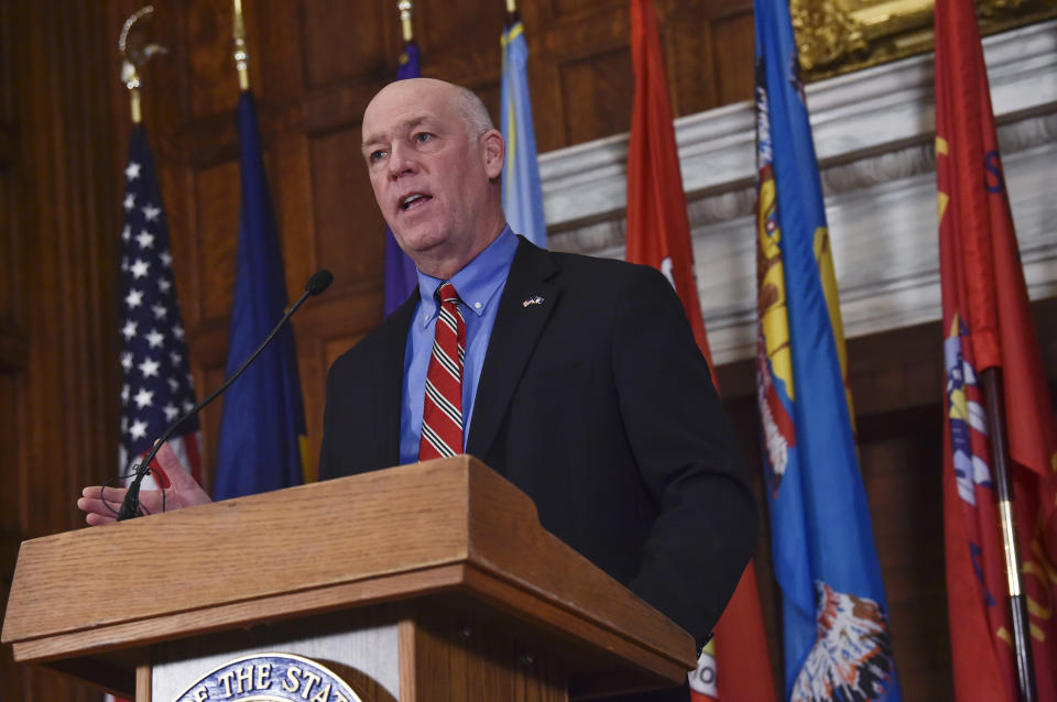 FILE - In this Jan. 5, 2021 file photo Montana Gov. Greg Gianforte speaks to members of the press in the Governor's Reception Room of the Montana State Capitol in Helena, Mont. Montana House lawmakers voted Monday, Jan. 25, 2021, to advance four bills that would restrict abortion access in the state, hoping to capitalize on the election of a Republican governor after 16 years of pro-abortion access Democratic governors in the state. Gianforte has promised to "defend life," giving anti-abortion lawmakers and activists hope that the bills will be signed into law. (Thom Bridge/Independent Record via AP, File)