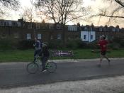 Public benches are taped off in Brockwell Park as the spread of the coronavirus disease (COVID-19) continues, London