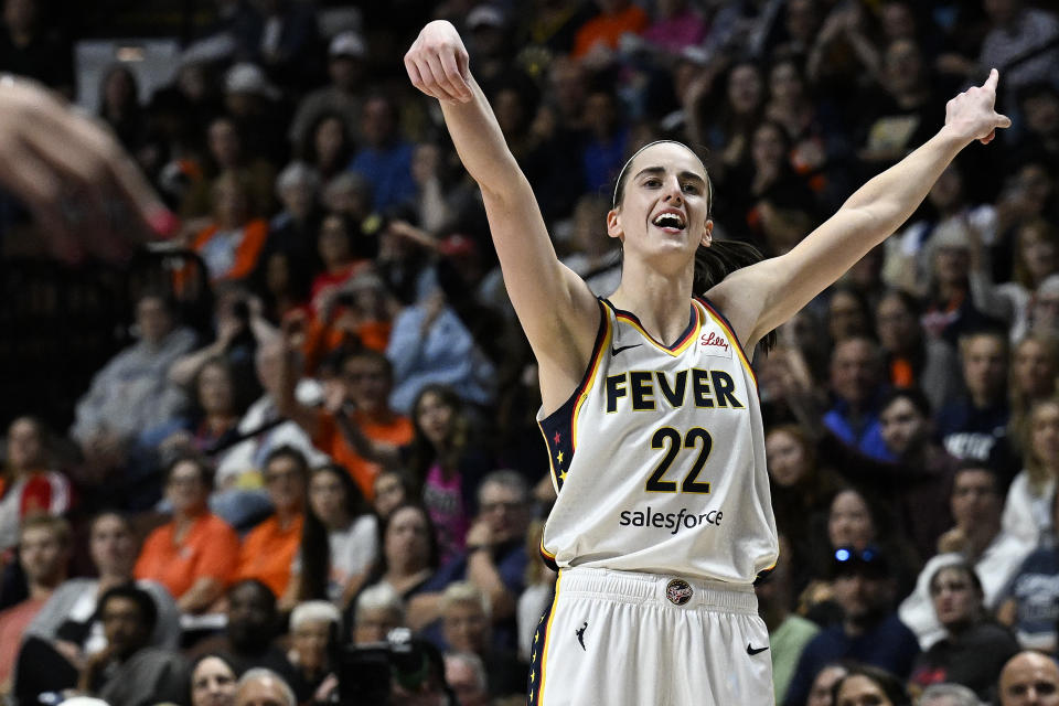 Indiana Fever guard Caitlin Clark (22) reacts after missing a 3-point shot against the Connecticut Sun during the fourth quarter of a WNBA basketball game, Tuesday, May 14, 2024, in Uncasville, Conn. (AP Photo/Jessica Hill)