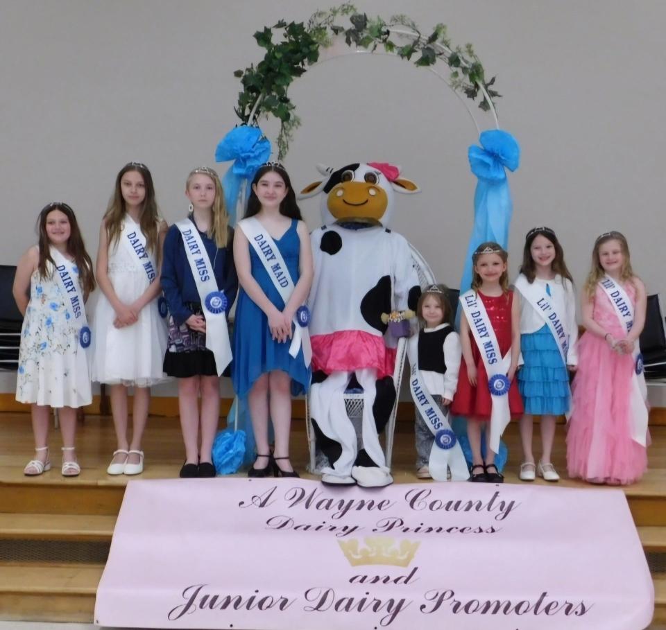The 2024-2025 Wayne County Dairy Court, from left: Dairy Miss Ruth, Dairy Miss Truly, Dairy Miss Chloe, Dairy Maid Zoey, Clarabella the cow, Lil Dairy Miss Teresa, Lil Dairy Miss Alice, Lil Dairy Miss Everly and Lil Dairy Miss Alice.