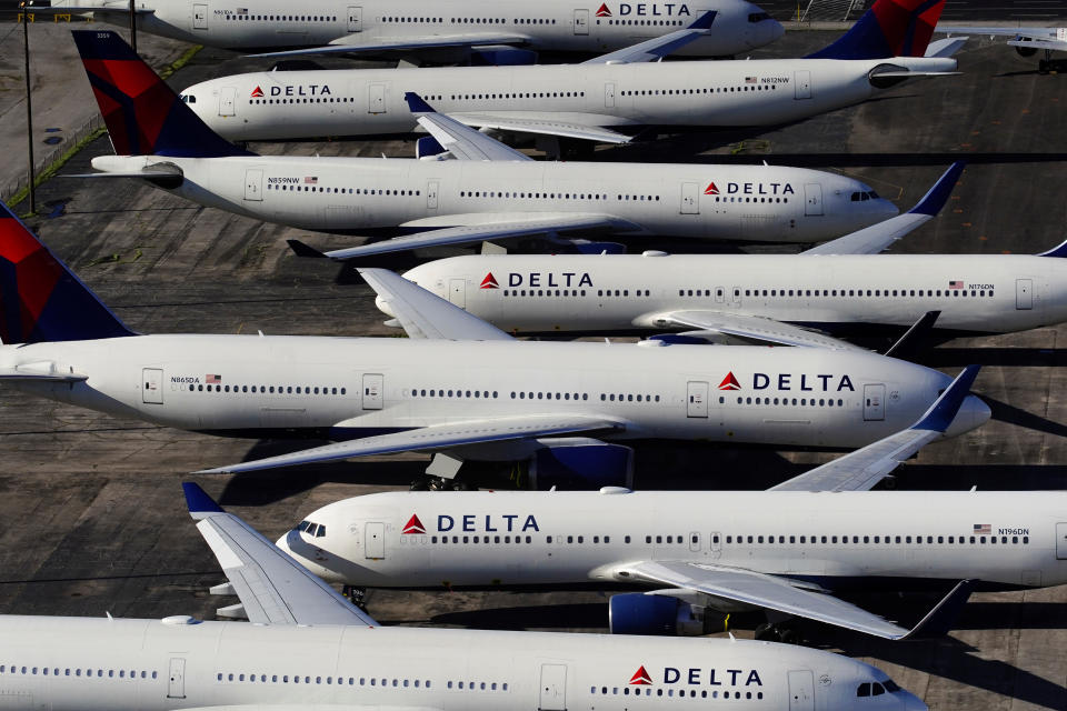 Delta Air Lines passenger planes are seen parked due to flight reductions made to slow the spread of coronavirus disease (COVID-19), at Birmingham-Shuttlesworth International Airport in Birmingham, Alabama, U.S. March 25, 2020. REUTERS/Elijah Nouvelage