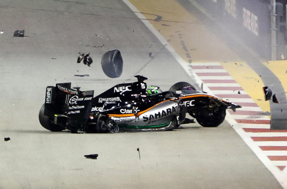 Debris flies off Force India driver Nico Hulkenberg