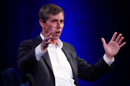 FILE PHOTO: Beto O'Rourke speaks to Oprah Winfrey on stage during a taping of her TV show in the Manhattan borough of New York City, New York, U.S., February 5, 2019. REUTERS/Carlo Allegri/File Photo