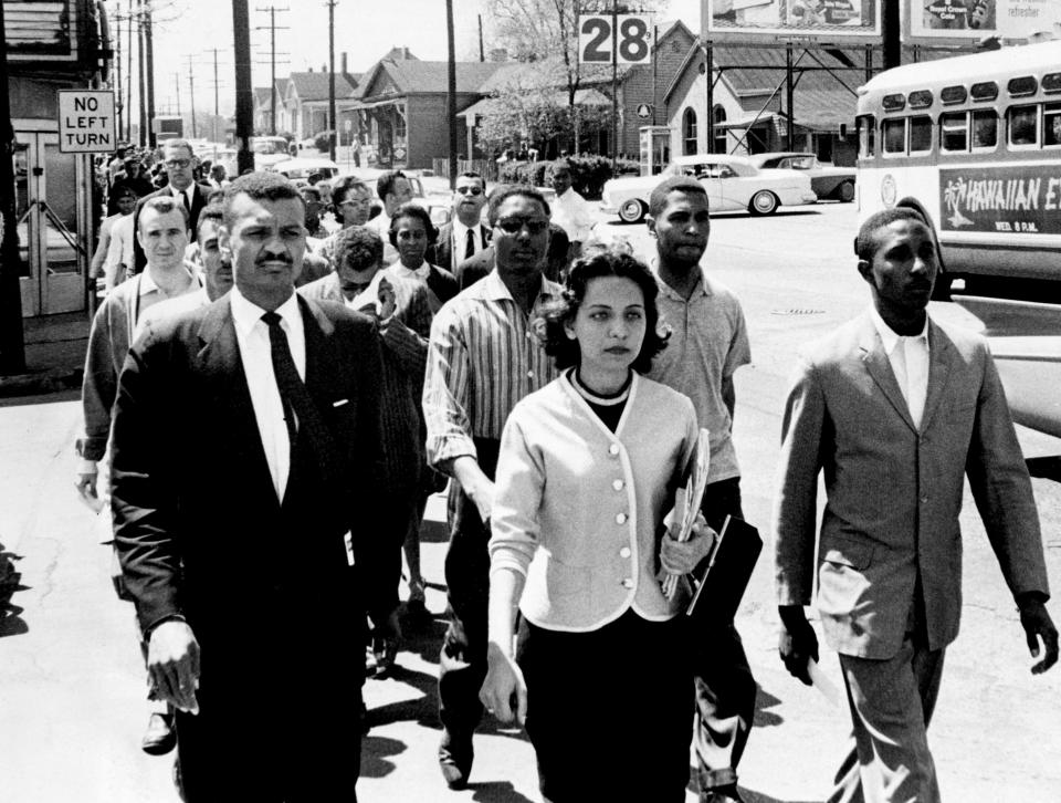 Black leaders march down Jefferson Street at the head of a group of 3000 demonstrators on April 19, 1960, and heading toward City Hall on the day of the Z. Alexander Looby bombing. In the first row, are the Rev. C.T. Vivian, left, Diane Nash of Fisk University, and Bernard Lafayette of American Baptist Seminary. In the second row are Kenneth Frazier and Curtis Murphy of Tennessee State A&I, and Rodney Powell of Meharry College.