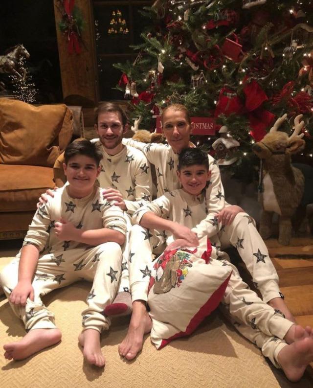 A family in matching onesies