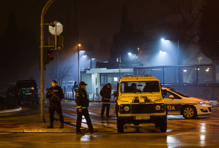 Police guard the entrance to the United States embassy building in Podgorica, Montenegro, February 22, 2018. REUTERS/Stevo Vasiljevic