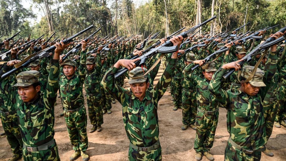 In this photo taken on March 8, 2023 members of ethnic rebel group Ta'ang National Liberation Army (TNLA) take part in a training exercise at their base camp in the forest in Myanmar's northern Shan State. - Stringer/AFP/Getty Images