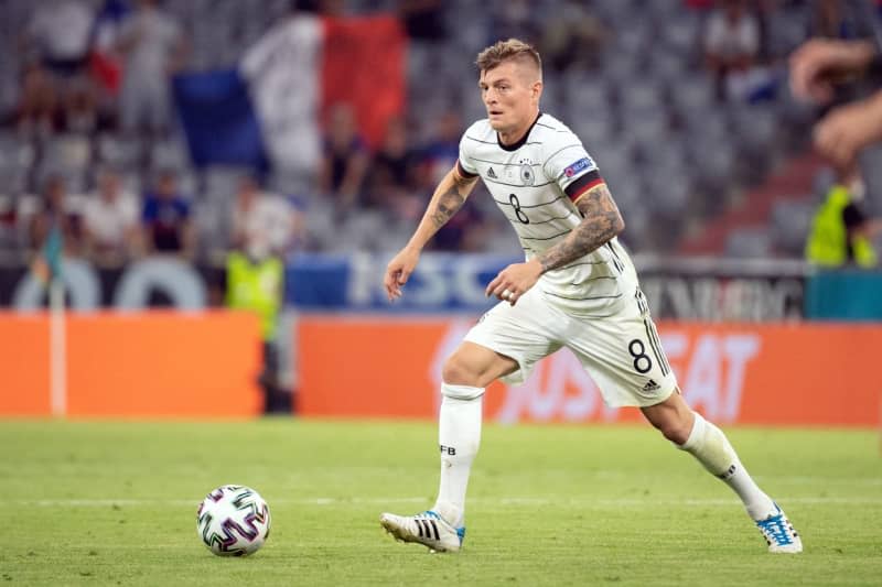 Germany's Toni Kroos in action during European Championship soccer match between Germany and France. German World Cup winner Toni Kroos has called for more respect for sporting idols in the country during their lifetime in the wake of Franz Beckenbauer's death on Sunday at age 78. Federico Gambarini/dpa