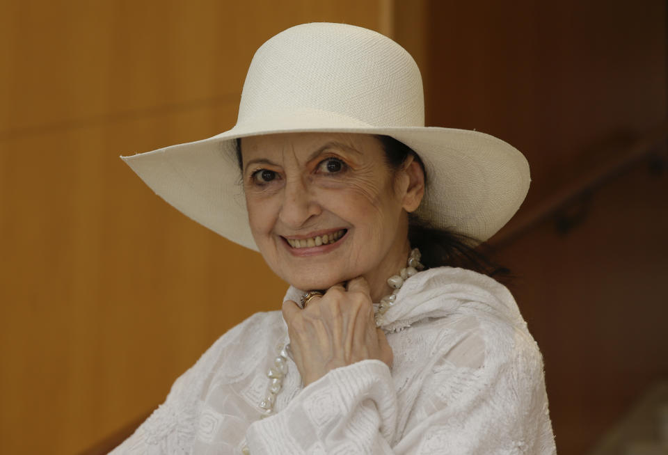 Italian ballet dancer Carla Fracci poses as she attends the presentation of the 'Stradivari Festival' in Milan, Italy, Tuesday, July 4, 2017. Carla Fracci has died Thursday, May 27, 2021 at her home in Milan, Italy, La Scala opera house announced Thursday. (AP Photo/Luca Bruno)