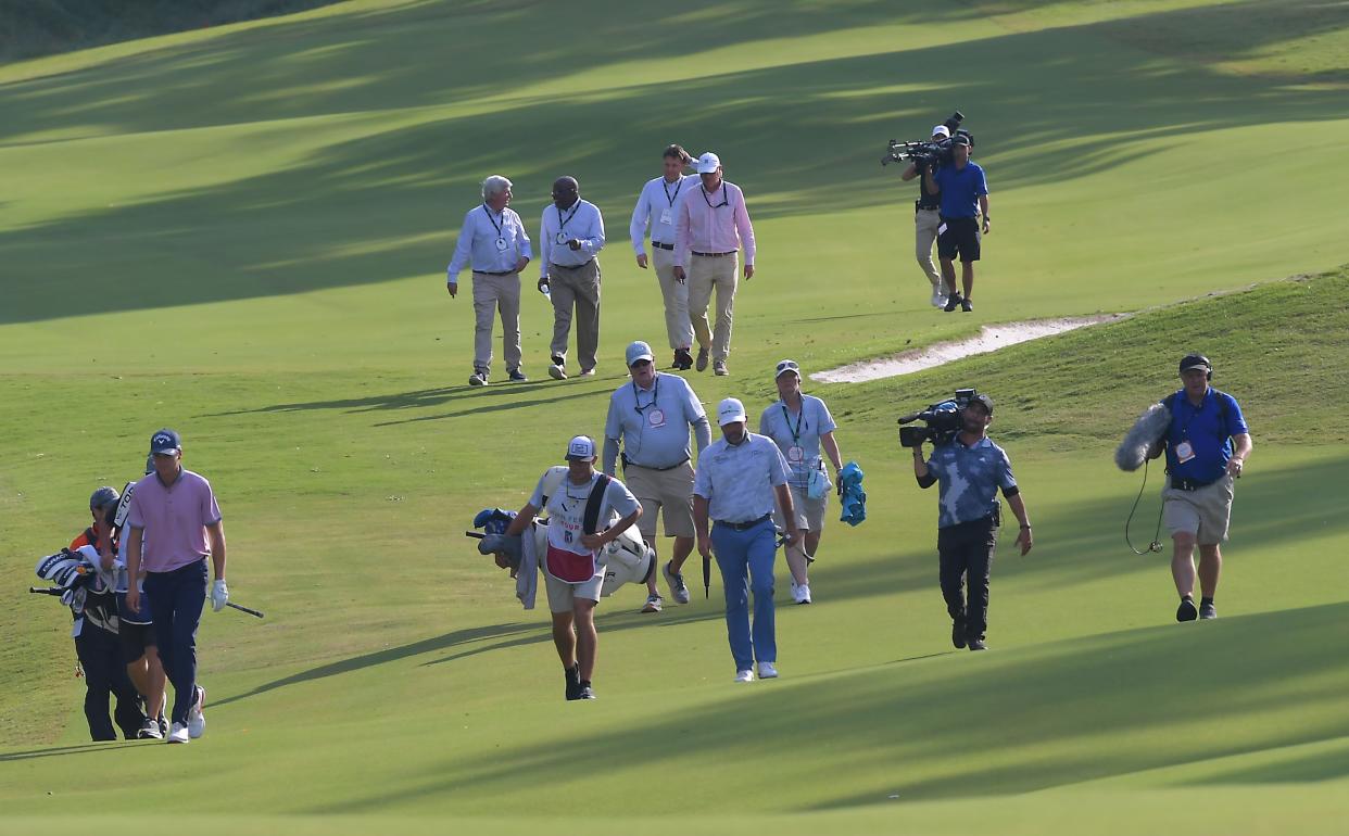 Rain interrupted final-round play in the BMW Charity Pro-Am golf tournament Sunday and caused a delay of three and a half hours. After the delay the final-round continued.