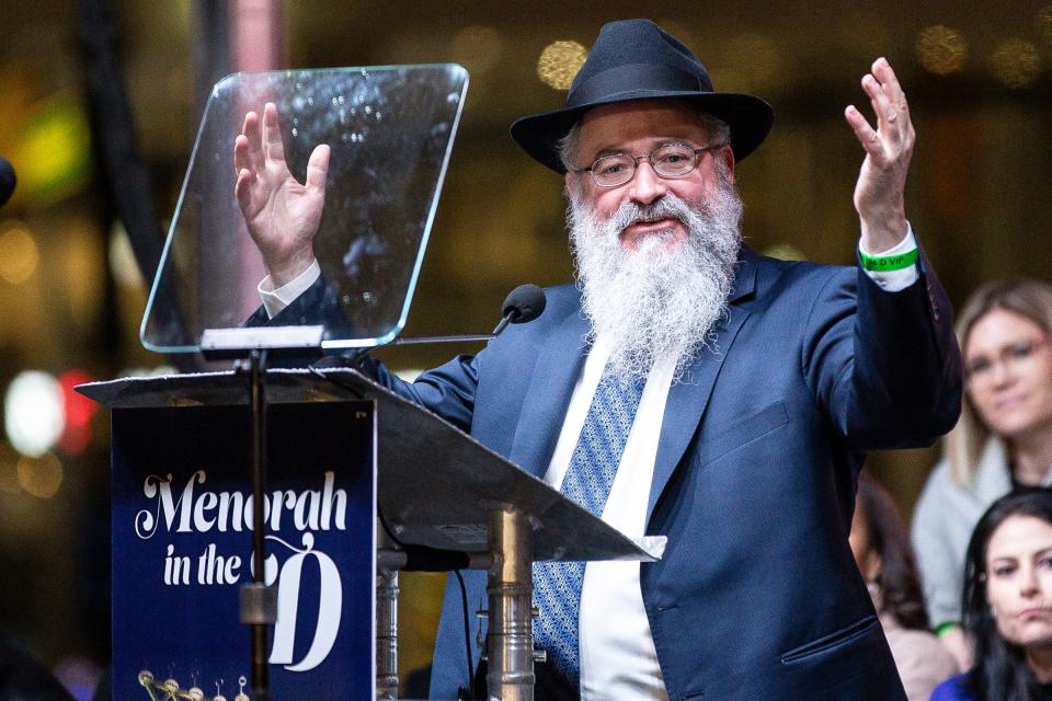 Rabbi Kasriel Shemtov speaks during the annual Menorah in the D at Campus Martius in Detroit on Thursday, Dec. 7, 2023.