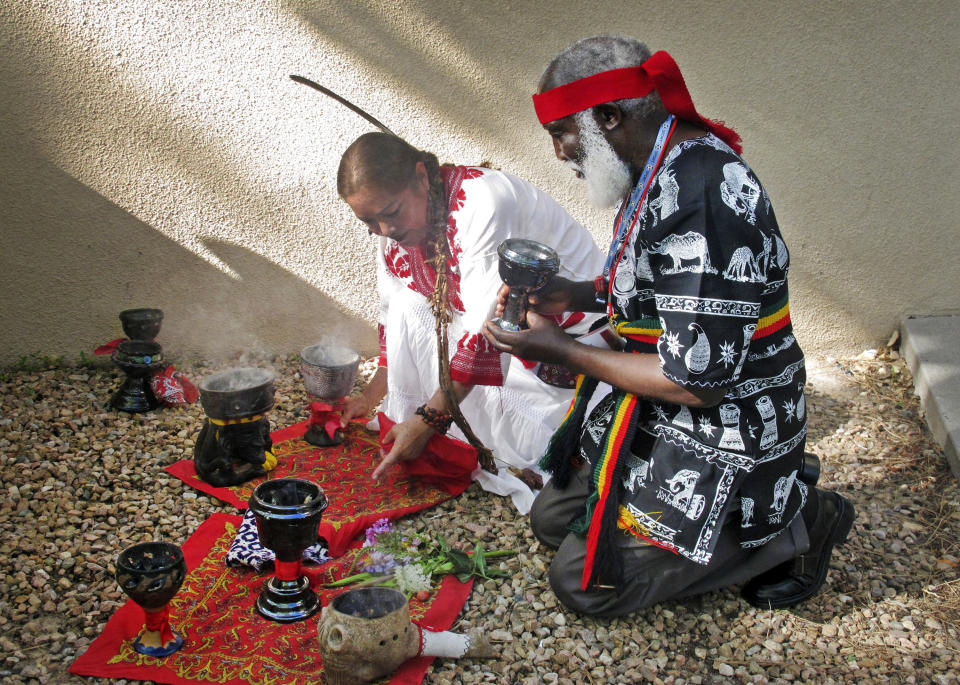 FILE - This July 22, 2013 file photo shows curanderos, or traditional healers, conducting a ceremony on the campus of the University of New Mexico in Albuquerque. "The Curse of La Llorona" promotion using traditional Mexican healers for "spiritual cleansings" before screenings is drawing strong criticism from healers and scholars. Critics say the movie released Friday, April 19, 2019, is based on a Mexican folktale that has nothing to do with healers known as curanderos and the promotion exploits traditional healing practices used by Mexicans and Mexican Americans just to sell a film. (AP Photo/Russell Contreras, File)