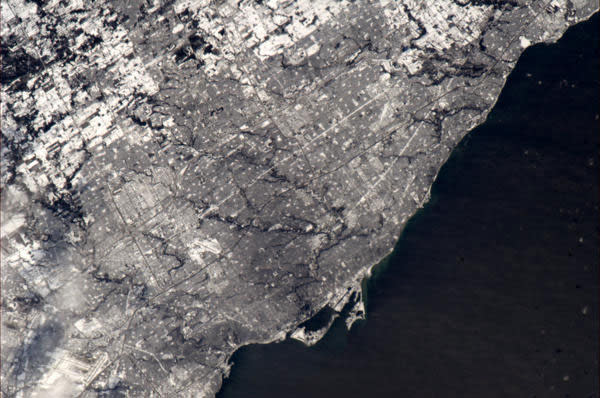 Toronto in snow - how it looked from the ISS today, 30 Dec at 12:35 local.