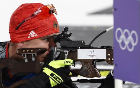 Biathlon - Pyeongchang 2018 Winter Olympics - Mixed Relay Final - Alpensia Biathlon Centre - Pyeongchang, South Korea - February 20, 2018 - Arnd Peiffer of Germany shoots. REUTERS/Murad Sezer