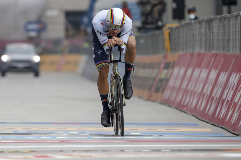 Reigning World Champion Italy's Filippo Ganna competes during the final stage of the Giro d'Italia cycling race, a 15.7 kilometers (9.756 miles) individual time trial from Cernusco sul Naviglio to Milan, Italy, Sunday, Oct. 25, 2020. (AP Photo/Luca Bruno)