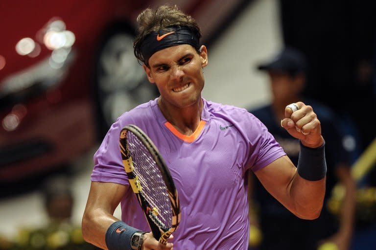 Rafael Nadal celebrates winning his Brazil Open match against Brazilian Joao Souza, on February 14, 2013. The former world number one needed only 78 minutes to prevail over Souza, ranked 140th in the world, 6-3, 6-4