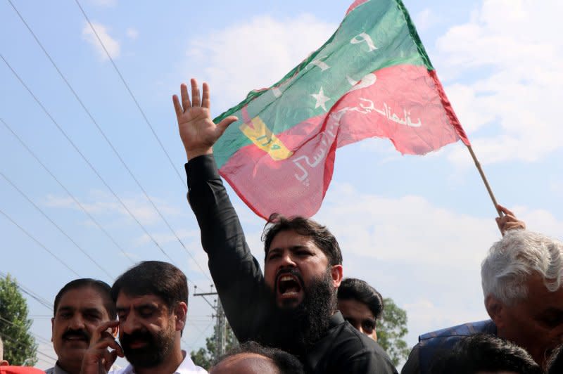 Supporters of the former Pakistani Prime Minister Imran Khan shout slogans n Muzaffarabad, Pakistan, on Saturday after he was arrested on corruption charges in the Toshakhana case. Photo by Amiruddin Mughal/EPA-EFE