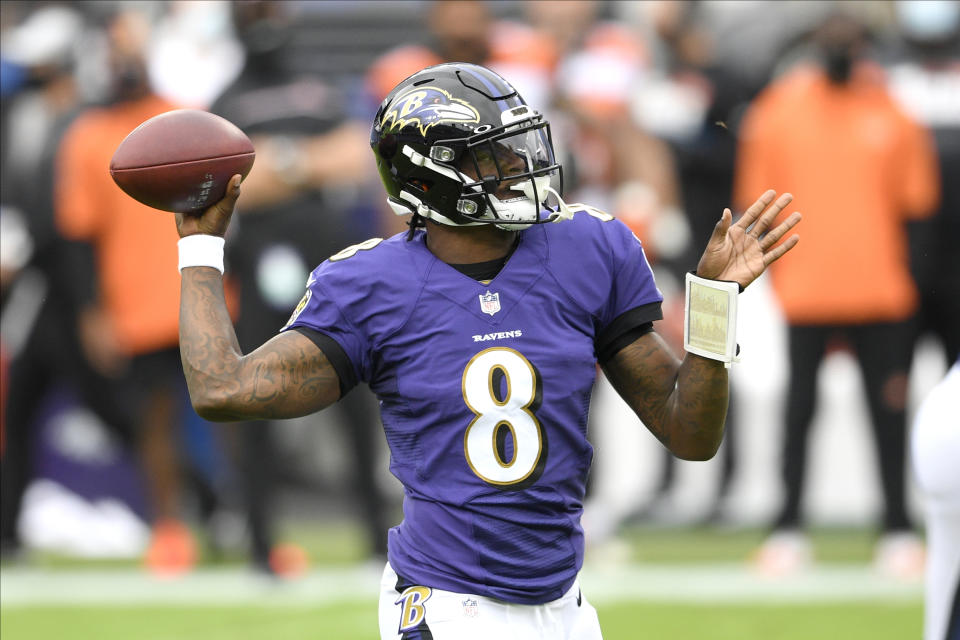 Baltimore Ravens quarterback Lamar Jackson throws a pass against the Cincinnati Bengals during the first half of an NFL football game, Sunday, Oct. 11, 2020, in Baltimore. (AP Photo/Nick Wass)