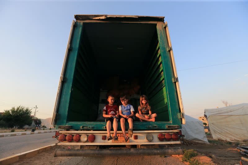 Yazidi displaced family al-Hamo leave their home in Sharya town and head back to Sinjar