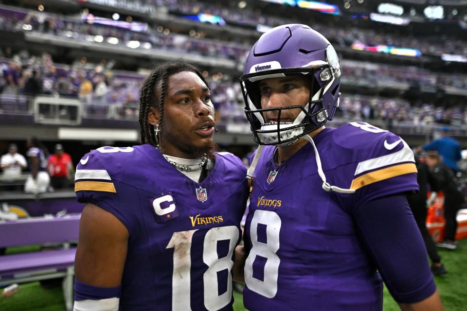 MINNEAPOLIS, MINNESOTA - SEPTEMBER 24: Justin Jefferson #18 of the Minnesota Vikings talks to Kirk Cousins #8 of the Minnesota Vikings after their 28-24 loss against the Los Angeles Chargers at U.S. Bank Stadium on September 24, 2023 in Minneapolis, Minnesota. (Photo by Stephen Maturen/Getty Images)