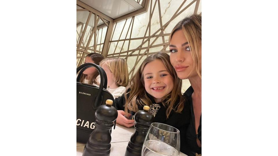 Abbey Clancy posing with daughter Liberty Rose