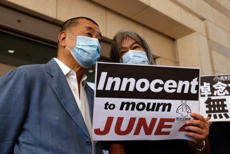 Media mogul Lai and activist "Long Hair" arrive at West Kowloon Courts in Hong Kong