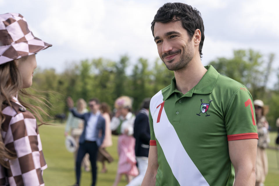 Eugenio Franceschini wearing a green shirt in Emily in Paris season 4