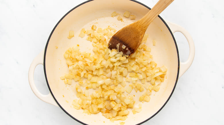 Onion and seasoning frying in pot