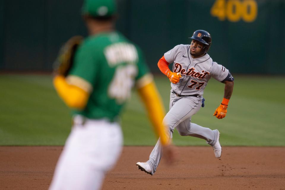 Detroit Tigers second baseman Andy Ibáñez (77) rounds second and heads for third on his triple against the Oakland Athletics during the first inning at Oakland Coliseum in Oakland, California, on Thursday, Sept. 21, 2023.