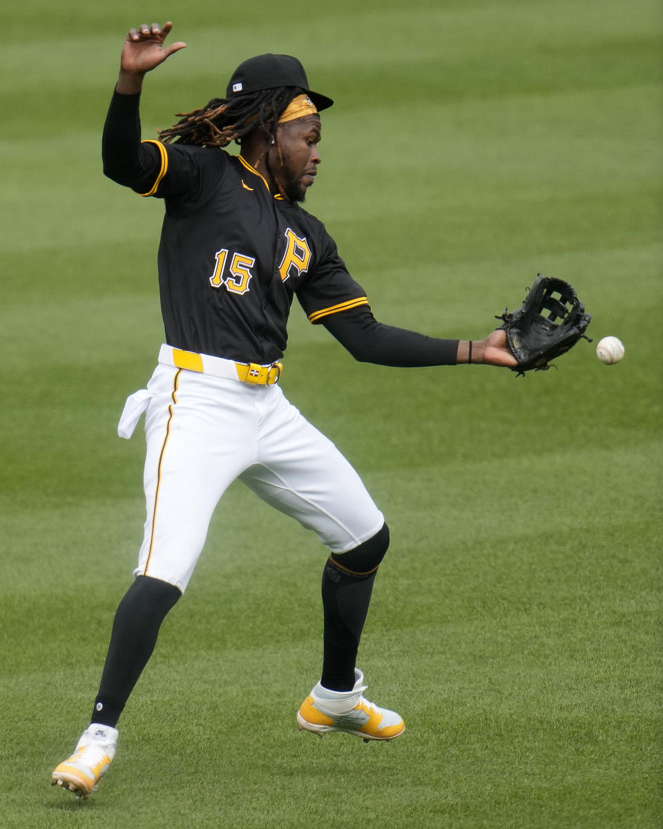 Pittsburgh Pirates shortstop Oneil Cruz misplays a popup by Boston Red Sox's Wilyer Abreu in short right center field during the eighth inning of a baseball game in Pittsburgh, Sunday, April 21, 2024. A run scored on the error. (AP Photo/Gene J. Puskar)