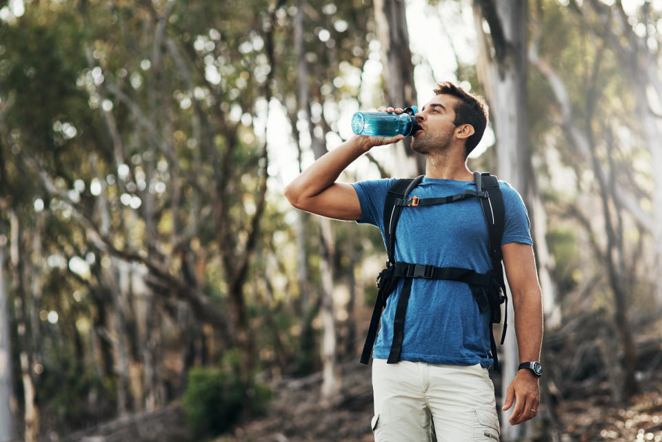 Man drinking water. (Getty Images)