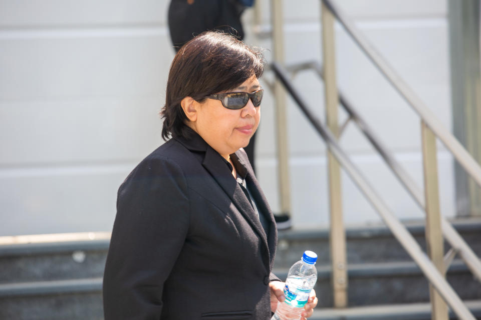 Phoon Chiu Yoke, 53, seen leaving the State Courts without her mask on 24 May 2021. (PHOTO: Dhany Osman / Yahoo News Singapore)