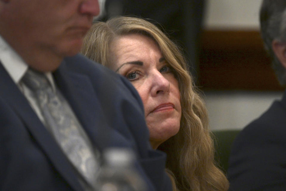 Lori Vallow Daybell sits during her sentencing hearing at the Fremont County Courthouse in St. Anthony, Idaho, Monday, July 31, 2023. Vallow Daybell has been sentenced to life in prison without parole Monday in the murders of her two youngest children and a romantic rival. The case has included bizarre claims that her son and daughter were zombies and that she was a goddess sent to usher in the Biblical apocalypse. (Tony Blakeslee/EastIdahoNews.com via AP, Pool)