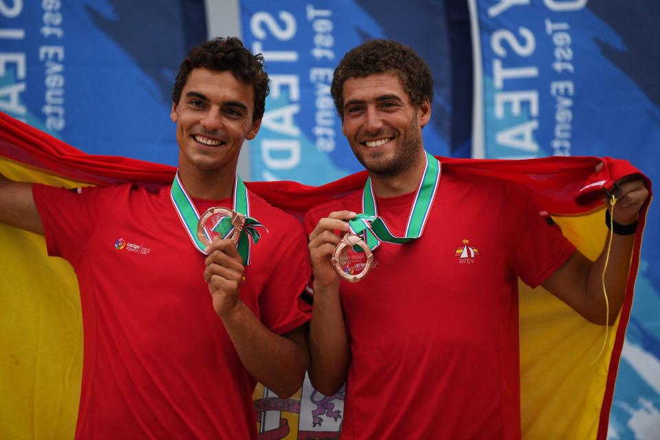 Spain's Jordi Xammar and Nicolas Rodriguez celebrate third place during the awards ceremony for the men's two person Dinghy 470 class medal competition at a sailing test event for the Tokyo 2020 Olympic Games, at Enoshima Yacht Harbour in Kanagawa Prefecture on August 22, 2019. (Photo by CHARLY TRIBALLEAU / AFP)        (Photo credit should read CHARLY TRIBALLEAU/AFP via Getty Images)